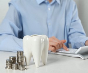 personal calculating the cost for dental treatment